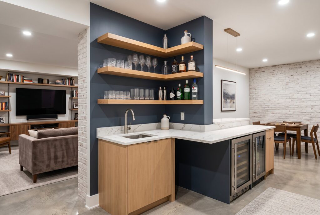 Floating corner bar with oak shelves, quartz countertop, and open concept basement layout. 